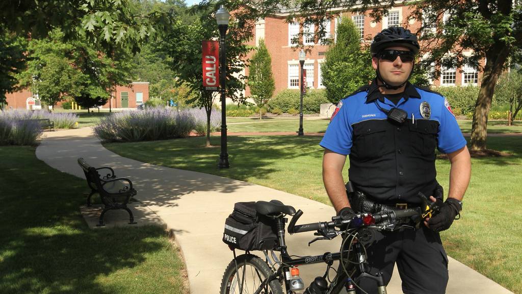A PennWest California bicycle police officer makes sure PennWest California campus is safe. 