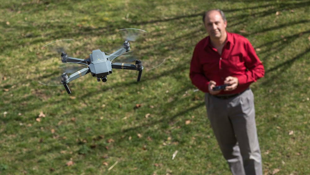 PennWest California Professor Juff Sumey flies a drone.
